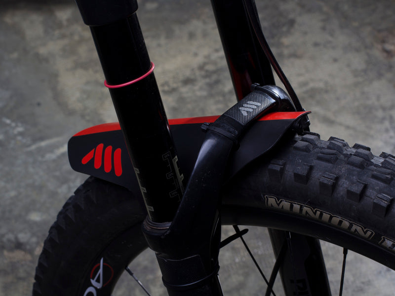 AMS Mud Guard in Red color on a mountain bike fork