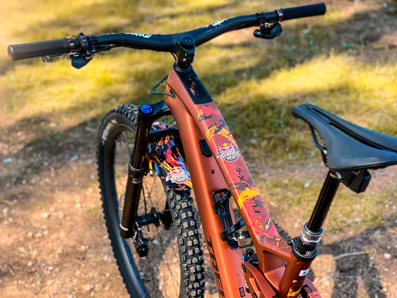AMS X Red Bull Rampage 2022 red and orange installed on a bike top tube