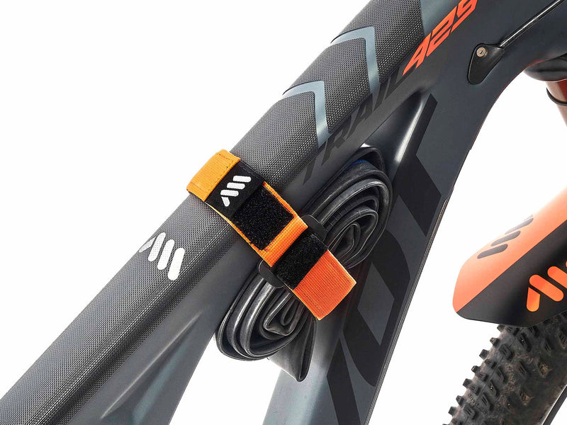 AMS hook and loop strap orange color installed on a bike