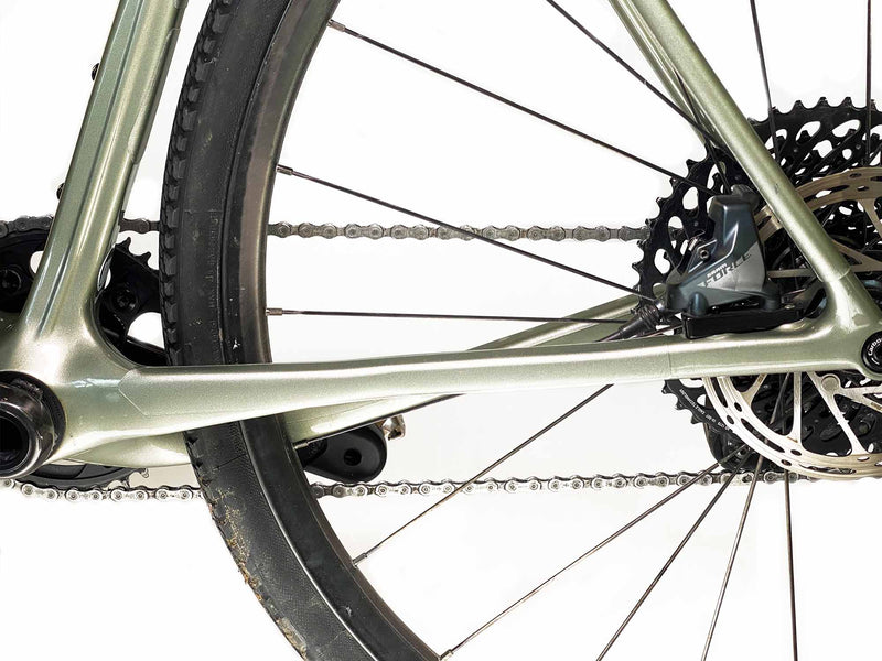 AMS Gravel/Road Frame Guard in TOTAL size CLEAR color on the stay of an Open UP gravel bike