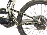 AMS Frame Guard in Full Size Combat Camo design black version on the stays of a clear colored mtb