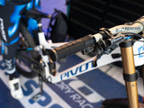 AMS SuperSoft grips in black product view from top front on a Pivot DH bike