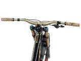 AMS X Bernard Kerr mtb grips product on a bike cockpit image
