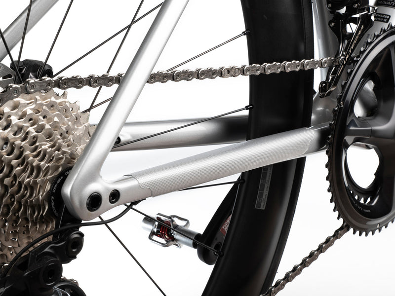 AMS Chain Guard for Road and Gravel protecting the chain stay view from the back