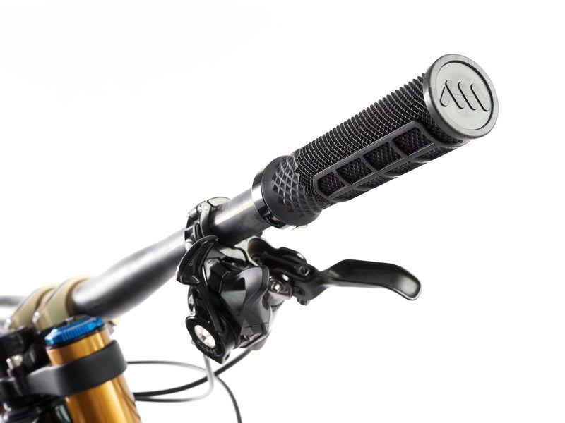 AMS Cero grips black color product installed on a handlebar down view