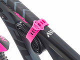 AMS OS silicone strap magenta color installed on a bike