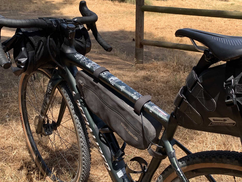 AMS Gravel and Road Frame Protection Bikepacking design in white on a bike ready for a trip